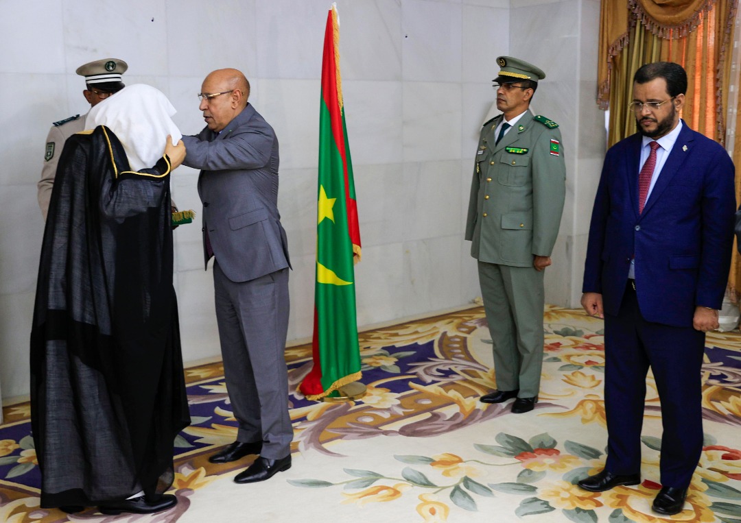 His Excellency the President of the Islamic Republic of Mauritania, Mohamed Ould Cheikh Ghazouani, awards His Excellency Sheikh Dr. Mohammed Al-Issa the medal of Commander of the National Order of Merit